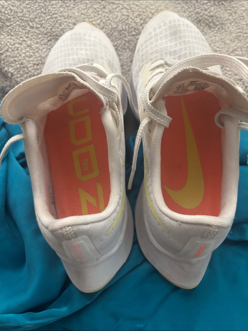 Nike Women's White Running Shoes with Yellow Accents